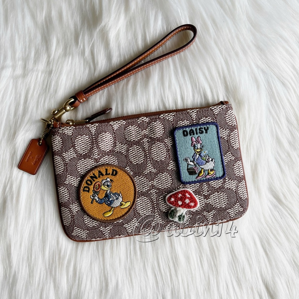 Coach x Disney Special  Edition Jacquard Leather Wristlet with Patches
